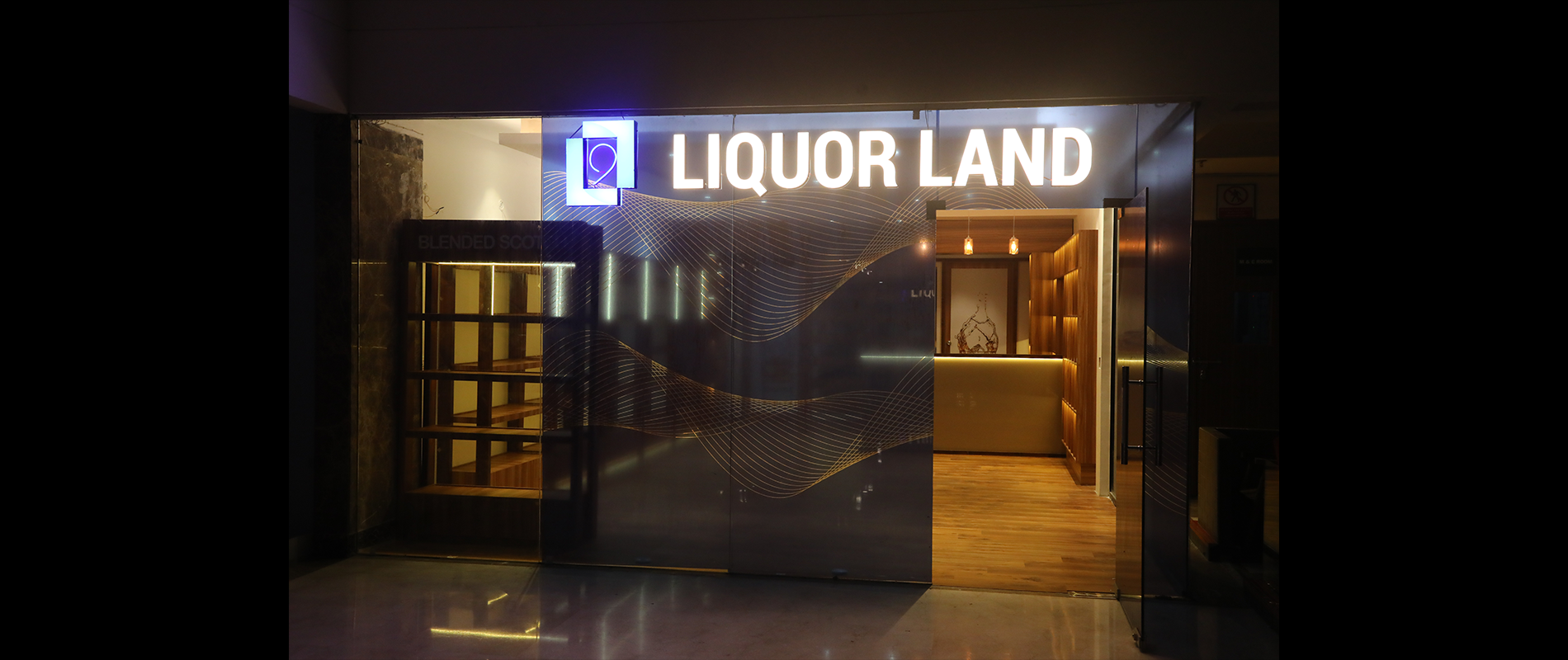 Interior branding and display racks for 9 Liquor Land Lucknow